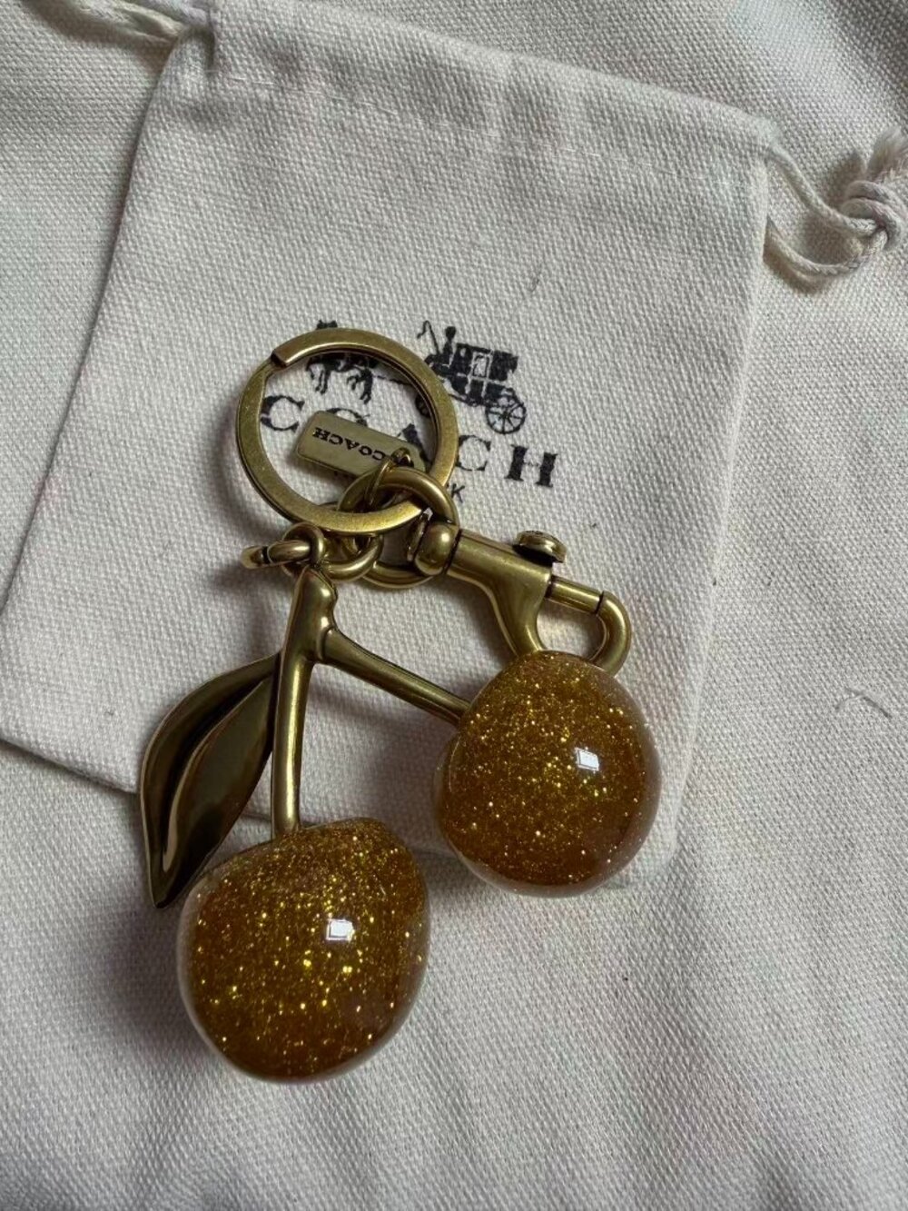 Coach Gold-Tone Glitter Cherry Keychain